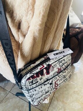 DKNY White Graffiti Print Messenger Crossbody with Black Strap and Red Accents